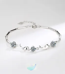 Detail of adjustable silver S925 dolphin bracelet with sparkling cubic zirconia stones