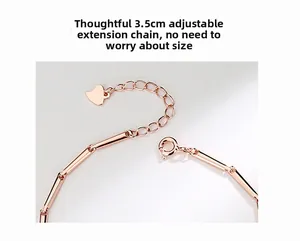 Detail of rose gold bracelet featuring a 3.5cm adjustable extension chain with heart charm