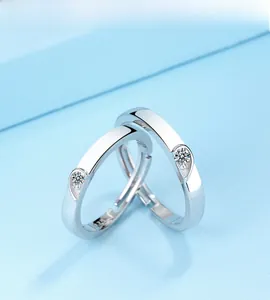 Detail of S925 sterling silver adjustable couple rings with heart-shaped inlay design