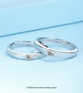 Macro shot of S925 sterling silver couple rings with polished finish and S925 hallmark