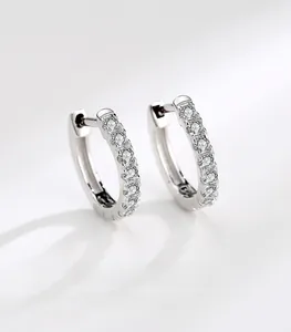 Detail view of S925 silver hoop earrings with micro-pave white cubic zirconia stones