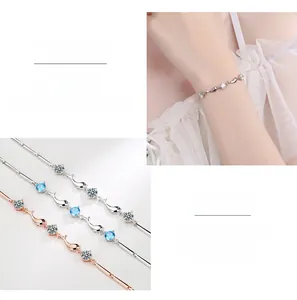 Detail of S925 silver dolphin bracelet featuring rose gold and silver cubic zirconia