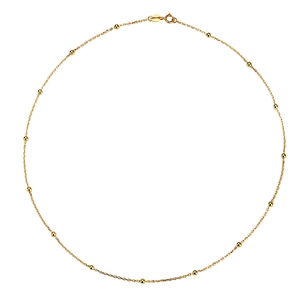 Minimalist gold satellite choker necklace with small beads on a thin chain, dainty style