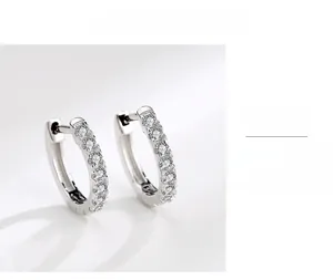 Detailed close-up of S925 sterling silver hoop earrings with micro-pave cubic zirconia