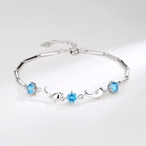 S925 sterling silver dolphin bracelet with sky blue zircons and lobster clasp design