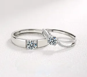Macro detail of S925 sterling silver couple rings with brilliant round-cut diamonds