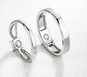 Detailed close-up showing polished S925 silver texture and white zircon stones on couple rings