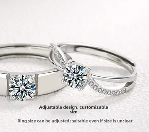 Macro detail of adjustable S925 silver couple rings with sparkling diamond accents
