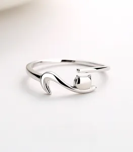 Macro shot of S925 sterling silver adjustable open ring with cute minimalist cat design