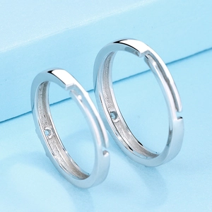 Polished S925 sterling silver minimalist heart open rings for couples on blue background