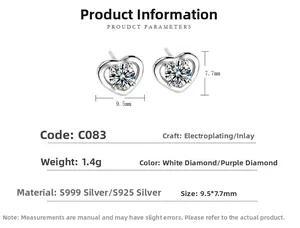 Dettaglio orecchini a cuore in argento S999 con brillanti zirconi incastonati