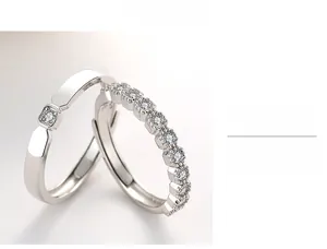 Close-up of S925 sterling silver couple rings with sparkling pavé cubic zirconia details