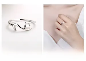 Close-up of S925 sterling silver adjustable cat ring with cat head and tail details