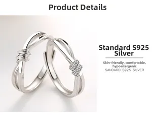 Vue macro de bagues de couple en argent 925 avec design de nœud et détails en zircon poli