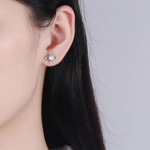 Sparkling S999 sterling silver four-pointed star stud earrings with zircon stone for women