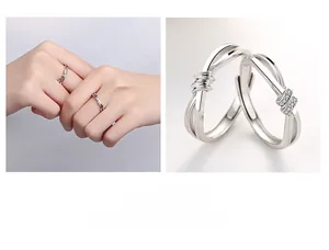 Détail macro de bagues nœud en argent S925 pour couples avec accents en pavé de cristal