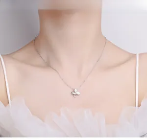 Close-up of S925 sterling silver butterfly pendant necklace with sparkling zircons