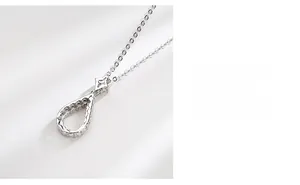 Detail of S925 sterling silver waterdrop pendant with star accent and multi-layer polishing