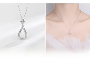 Macro detail of S925 sterling silver water drop pendant with sparkling cubic zirconia