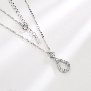 Elegant S925 sterling silver hollow teardrop necklace with sparkling zircon crystals