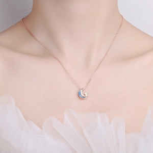 Élégant collier en argent S925 or rose avec pendentif lune et étoile en zircon bleu