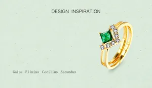 Detail of S925 emerald open ring with V-shaped diamond setting and double bands