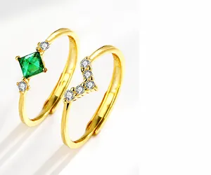Detail of S925 emerald cut green gem ring set with V-shaped wave band and gold plating