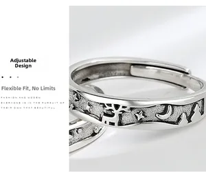 Detail of adjustable S925 silver ring featuring vintage elk and moon etched patterns