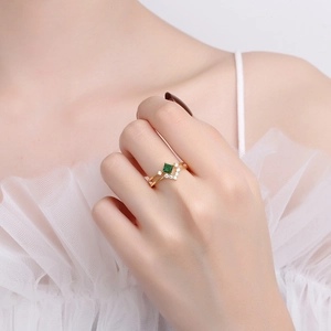 Elegant S925 silver gold-plated ring with emerald square gem and crown zircon accents