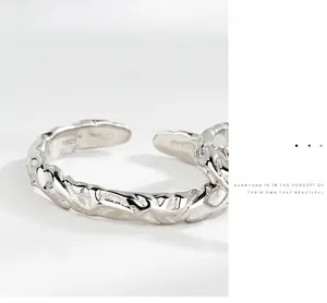 Detailed close-up of S925 sterling silver ring featuring a unique hammered paper texture