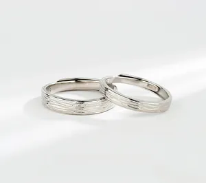 Detail of S925 sterling silver couple rings showing inner engraved S925 hallmark