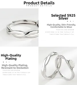 Detail of S925 sterling silver couple ring set with shell inlay and twisted band