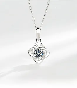 Detailed view of S925 sterling silver four-leaf clover pendant with sparkling moissanite