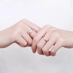 Minimalist S925 sterling silver couple rings with textured bark pattern on hands