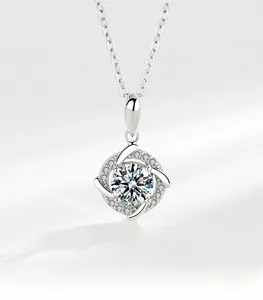 Detail of S925 silver moissanite necklace with spinning windmill design and brilliant fire
