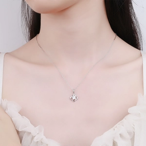 S925 Sterling Silver Four-Leaf Clover Moissanite Necklace on an elegant model neck