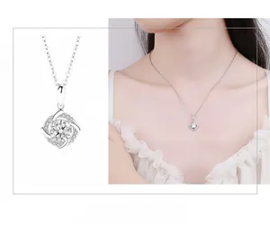 Detail of silver windmill pendant with moissanite stones and on-model display