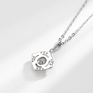 Silver windmill pendant necklace with sparkling moissanite stones and classic cross chain
