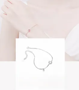 Close-up of S925 silver heart bracelet showing rose gold finish and extension chain details