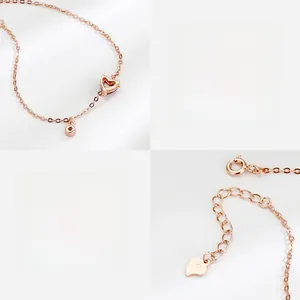 Detailed macro view of S925 sterling silver heart bracelet with rose gold finish