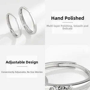Macro detail of adjustable S925 sterling silver couple rings showing the engraved hallmark