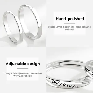Macro detail of S925 sterling silver couple rings showing the Only Love You engraving
