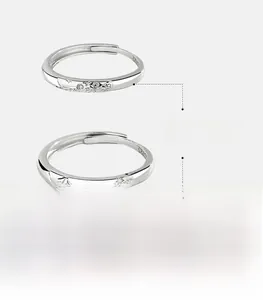 Macro shot of S925 sterling silver couple rings showing wave and mountain patterns