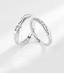 Detail shot of S925 sterling silver couple rings with Only Love You engraving