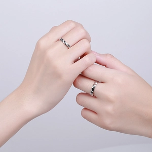 S925 sterling silver couple rings featuring moon and star engravings in a polished finish