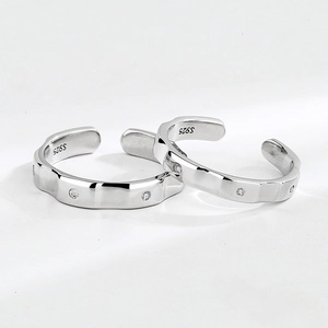 Minimalist S925 sterling silver open ring with irregular wave pattern and white zircon