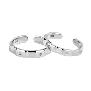 Minimalist S925 sterling silver couple rings with irregular wave texture and zircons