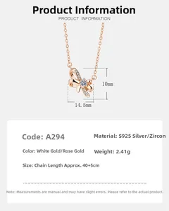 Détail macro du pendentif nœud en argent S925 avec zircon incrusté et dimensions de taille