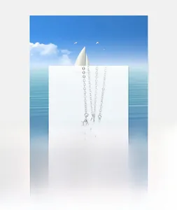Macro detail of S925 silver boat pendant with sparkling stones on a harbor theme