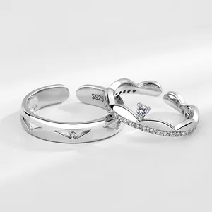 Close-up of S925 sterling silver couple rings with crown design and S925 hallmark